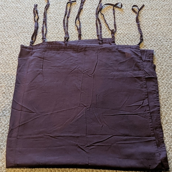 Two World Market sheer curtain panels